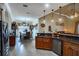 Well-equipped kitchen with granite countertops and a seamless view into the dining area at 290 Thomas Dr, Casselberry, FL 32707