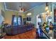 Comfortable living room with hardwood floors, a ceiling fan, and recessed lighting at 290 Thomas Dr, Casselberry, FL 32707