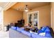 Cozy outdoor patio with comfortable seating and a grill area at 290 Thomas Dr, Casselberry, FL 32707