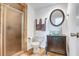 Modern bathroom features a glass bowl sink and walk-in shower at 2909 Depauw Ave, Orlando, FL 32804