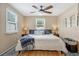 Comfortable bedroom with ceiling fan, neutral decor, and great natural light at 2909 Depauw Ave, Orlando, FL 32804