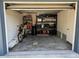 Functional garage space, ready for storage and hobbies, with room for bikes and shelving at 2909 Depauw Ave, Orlando, FL 32804