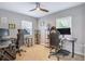 Home office with two desks, comfortable chairs, and windows for natural light at 2909 Depauw Ave, Orlando, FL 32804