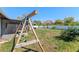 Spacious backyard with lush grass, swing set, and privacy fence at 3117 Lake Mar Ln, Orlando, FL 32806