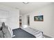 Bright, spacious bedroom featuring large closets and a television on the wall at 3962 Lana Ave, Davenport, FL 33897