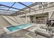 Private pool area with brick paving, a safety fence, and a lounge for relaxation at 3962 Lana Ave, Davenport, FL 33897