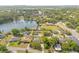 Stunning aerial view of lakefront property with lush greenery and homes at 4210 Shorecrest Dr, Orlando, FL 32804