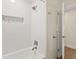 Updated bathroom features a shower-over-tub with white subway tile and modern fixtures at 4210 Shorecrest Dr, Orlando, FL 32804