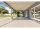 Covered patio with gray beams overlooks the backyard at 4210 Shorecrest Dr, Orlando, FL 32804