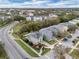 Picturesque neighborhood featuring mature trees, sidewalks, and well-kept homes at 5852 Mariposa Cove Ln, Orlando, FL 32822