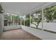 Screened patio overlooking a well maintained, landscaped backyard at 5852 Mariposa Cove Ln, Orlando, FL 32822
