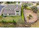 Aerial view of the backyard and community playground of this home at 619 Oxford Chase Dr, Winter Garden, FL 34787