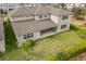 Aerial view of home with backyard, patio, and proximity to nearby community playground at 619 Oxford Chase Dr, Winter Garden, FL 34787