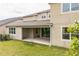Relax on the backyard patio with covered space at 619 Oxford Chase Dr, Winter Garden, FL 34787