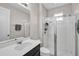 Bathroom featuring a glass-enclosed shower, sleek vanity, and modern fixtures at 619 Oxford Chase Dr, Winter Garden, FL 34787