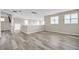 Bright bonus room featuring wood-look flooring and natural light at 619 Oxford Chase Dr, Winter Garden, FL 34787