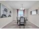 Elegant dining room with stylish chandelier, hardwood floors, and sophisticated decor at 619 Oxford Chase Dr, Winter Garden, FL 34787