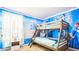 Themed bedroom with bunk bed and 'Frozen' wall decor at 7219 Oakmoss Loop, Davenport, FL 33837