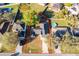 This aerial shows property lines, mature trees, a private backyard, and nearby community at 738 Paris Dr, Kissimmee, FL 34759