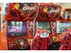 Close up of arcade racing game featuring immersive graphics and comfortable seating at 7709 Comrow St, Kissimmee, FL 34747