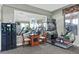 Arcade games room featuring a fighter jet simulator and change machines for gaming at 7709 Comrow St, Kissimmee, FL 34747