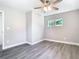 Bedroom featuring gray walls, wood-look floors, and a ceiling fan at 815 Agnes Dr, Altamonte Springs, FL 32701