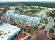 A charming aerial view of the apartment complex with blue and white buildings at 871 City Walk Ln # B-1, Oviedo, FL 32765