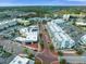 Aerial view of community with modern townhomes, green spaces, stores and restaurants at 871 City Walk Ln # B-1, Oviedo, FL 32765