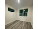 The bedroom has vinyl floors and lots of natural light at 871 City Walk Ln # B-1, Oviedo, FL 32765