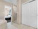 Bright bathroom featuring a shower, closet, and vanity at 8762 Worldquest Blvd # 6506, Orlando, FL 32821