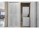 Convenient laundry closet with a stacked washer and dryer unit at 8762 Worldquest Blvd # 6506, Orlando, FL 32821