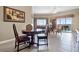 Inviting dining/living area with tile floors, ceiling fan, and comfortable seating for relaxing and entertaining at 8762 Worldquest Blvd # 6506, Orlando, FL 32821