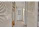 Hallway featuring closets, storage and bright, neutral paint color at 100 S Interlachen Ave # 304, Winter Park, FL 32789