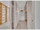 Hallway features neutral carpet, and ample storage with built-in shelves and multiple closets at 100 S Interlachen Ave # 304, Winter Park, FL 32789