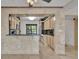 Kitchen with a breakfast bar and view to exterior at 100 S Interlachen Ave # 304, Winter Park, FL 32789