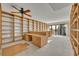 Large living room area with custom built in bookshelves and a view from the balcony at 100 S Interlachen Ave # 304, Winter Park, FL 32789