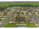 Aerial view of the property showing the house within the surrounding neighborhood at 105 Adoncia Way, Sanford, FL 32771