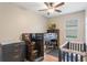 bedroom featuring a bunk bed, crib and stylish decor at 105 Adoncia Way, Sanford, FL 32771