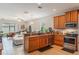 Modern kitchen seamlessly connects to the living area, creating an open concept design at 105 Adoncia Way, Sanford, FL 32771