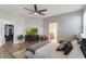 Spacious main bedroom featuring wood floors, ensuite bath, and a walk-in closet at 105 Adoncia Way, Sanford, FL 32771