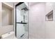 Beautiful bathroom featuring modern glass shower and a recessed shower niche at 1100 S Orlando Ave # 301, Maitland, FL 32751