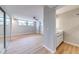 Bright bedroom featuring a partial bathroom with attractive white cabinets and sink at 1100 S Orlando Ave # 301, Maitland, FL 32751