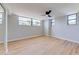 Bright bedroom featuring ceiling fan and beautiful wood floors at 1100 S Orlando Ave # 301, Maitland, FL 32751