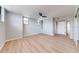 Bright, airy bedroom with light wood floors, neutral walls, and modern ceiling fan at 1100 S Orlando Ave # 301, Maitland, FL 32751