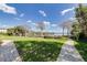 Beautiful grassy lawn with mature landscaping and waterfront access with private boat slips at 1100 S Orlando Ave # 301, Maitland, FL 32751