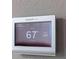 Smart thermostat with digital display showing temperature, humidity, and settings at 1100 S Orlando Ave # 301, Maitland, FL 32751