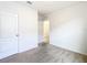 Bedroom features carpet, two doors, neutral walls, and electrical outlets at 1133 August Sky Dr, Deltona, FL 32738