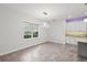 Dining room with a modern chandelier, white cabinetry, and tiled floors at 1222 Shorecrest Cir, Clermont, FL 34711