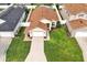 Aerial view of a well maintained single-story house with lush green lawn at 131 Sonja Cir # 1, Davenport, FL 33897