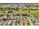 Aerial shot highlights the neighborhood's proximity to a golf course and surrounding community amenities at 131 Sonja Cir # 1, Davenport, FL 33897